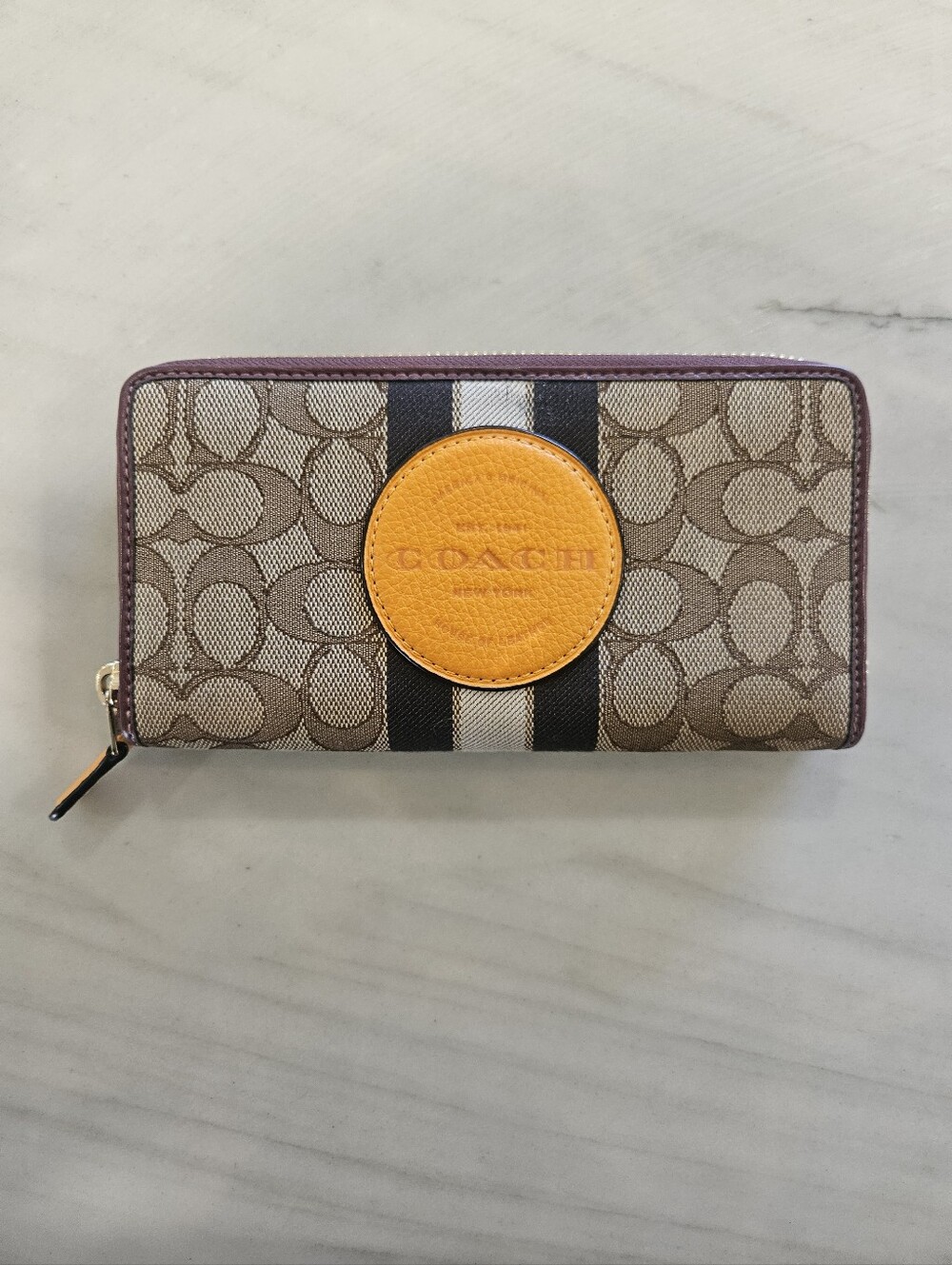 COACH Signature Canvas Continental Wallet in Brown with Orange Patch